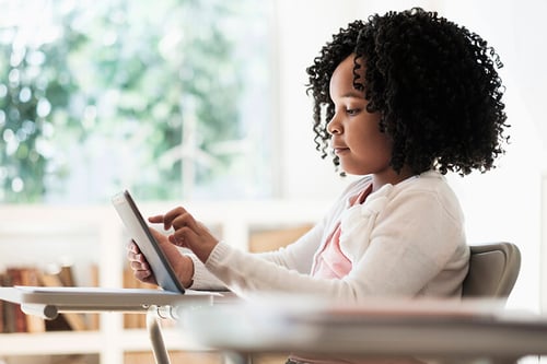 girl studying using tablet